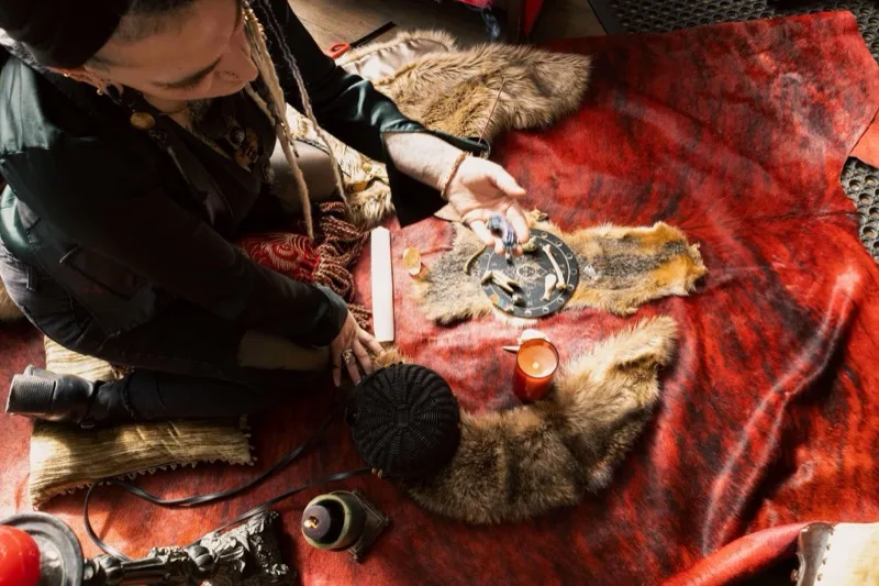 Andrea creating handmade art jewelry from foraged materials